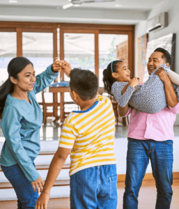 A family of four together at home, sharing the moment in a safe place. Learn how a child therapist in Branchburg, NJ can offer support with anxiety coping skills for kids. Find a child therapist in Scotch Plains or Branchburg and search for anxiety counseling in scotch plains, nj and other services. 