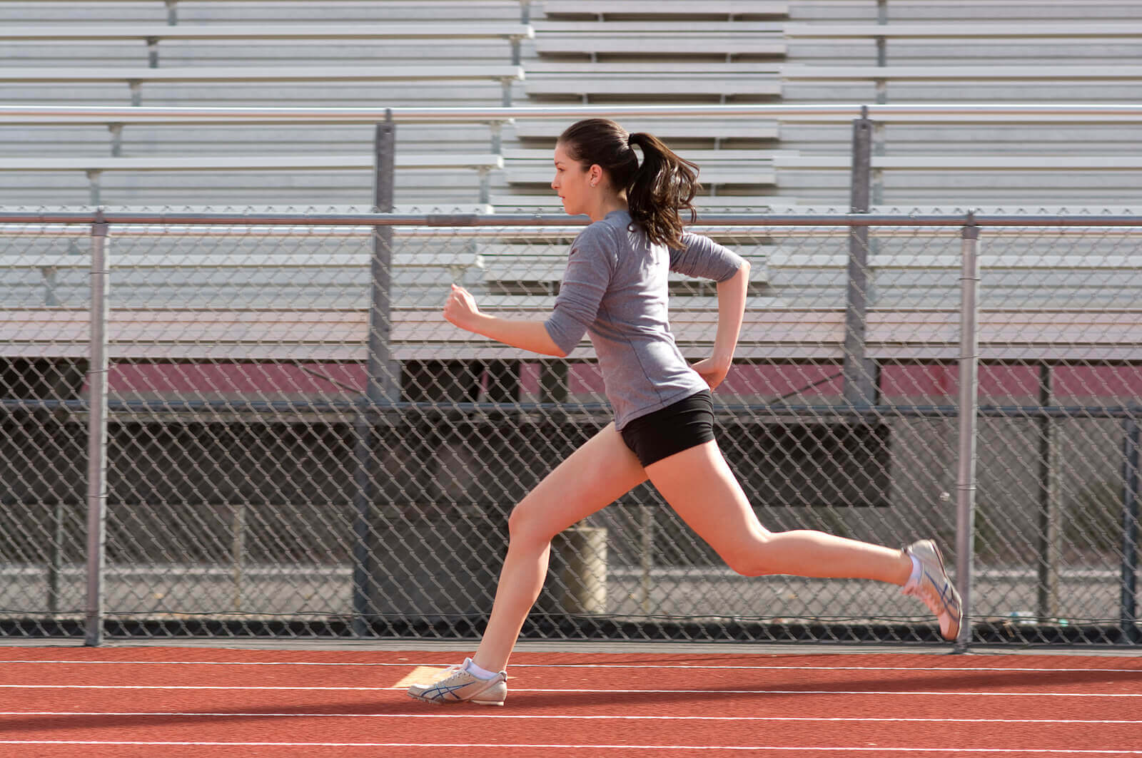 A teen girl runs on a track, representing the benefits of exercise for teens. Learn how therapy for teens in Branchburg, NJ can offer support with coping with misakes for teens and teen athletes. Search for teen counselor Scotch Plains, NJ today or online therapy for teens today.