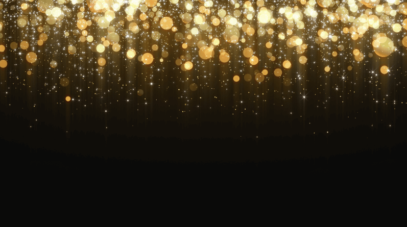 Gold glitter dropping on black background. Working with a grief counselor in New Jersey can be helpful after the death of a beloved celebrity like Liam Payne.