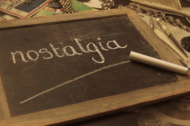 The word nostalgia written on a small blackboard in chalk. Nostalgia can be bittersweet following the death of a celebrity. Grieving counseling in Scotch Plains, NJ can help you move forward after loss.