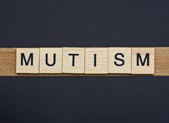 A close up of the word mutism.